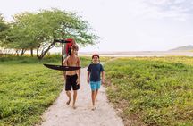 Surf Foil Lesson in Tamarind Fly over the water
