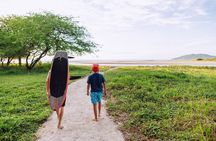 Surf Foil Lesson in Tamarind Fly over the water