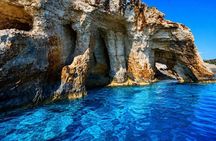 Zakynthos Sunset Boat Tour to Blue Caves, Swim Stops and Aperitif