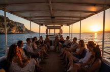 Zakynthos Sunset Boat Tour to Blue Caves, Swim Stops and Aperitif