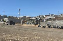 Ride in four-wheelers/paintball mountains of Rosarito & tacos