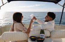 Sunset on Luxury Yacht Includes a Drink