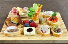 Tasting of Venetian cicchetti among the olive trees at Lake Garda