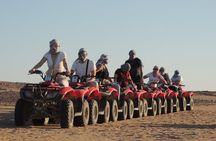 El Gouna Sunset Safari tour by Quad bike, Through The Dry Canyon, and Sand Dunes