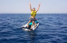 A day at sea in Cala Blanca with paella and jet ski