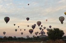 Balloon sunrise over Teotihuacan and Basilica pyramids