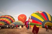 Balloon sunrise over Teotihuacan and Basilica pyramids