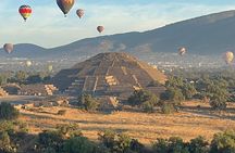 Balloon sunrise over Teotihuacan and Basilica pyramids