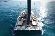 Full Day Catamaran Cruise with BBQ and Open Bar on Costa Dorada