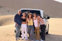 Evening Desert Safari Abu Dhabi Camel Ride & Sand Boarding