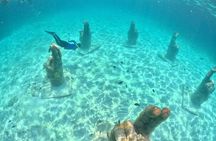 Dream catamaran in Isla Mujeres with buffet snorkel and open bar