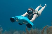Snorkeling with sea scooters and scenic boat ride