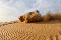 Abu Dhabi Desert Safari with Sandboarding, Camel Ride & Dinner