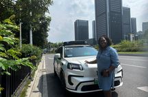 Guangzhou: Self-Driving Robotaxi Experience with Guide
