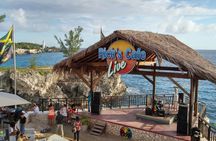 Ricks Cafe Seven Mile Beach and Souvenir Shopping Experience