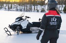 Snowmobile Safari through Lappish Forest from Rovaniemi