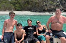 Private fishing and snorkeling boat with open bar and food included