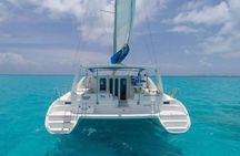 Snorkeling Catamaran to Isla Mujeres with Beach Club & Party