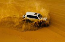Abu Dhabi Desert safari with BBQ Dinner,Sandboarding & Camel ride