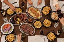 Traditional Argentine Dinner at a Local Bodegón with Wine Tasting
