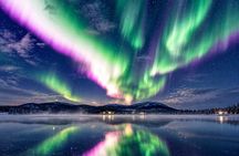 Northern Lights Hunt from Rovaniemi with Folk Tales and Snacks over Campfire