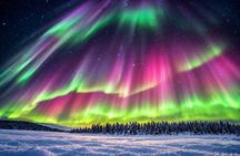 Northern Lights Hunt from Rovaniemi with Folk Tales and Snacks over Campfire