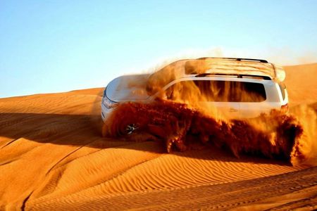 Dubai desert adventure with buggy, dune bashing and camel ride
