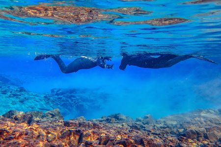 Snorkel between Continents in Silfra