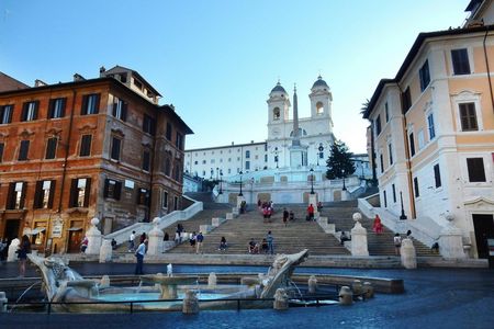 Walking tour with Tiber cruise and Trastevere food tasting
