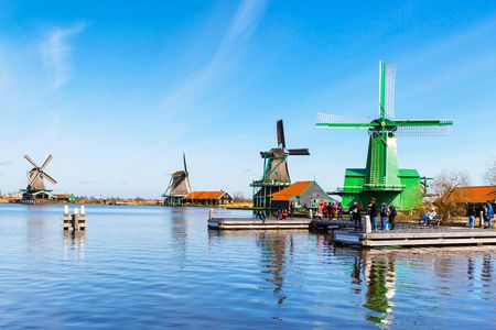 Sightseeing tour of windmills, cheese farm and Volendam with private transportation