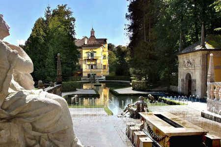 Boat trip to Hellbrunn Palace with trick fountain and London double-decker bus