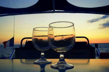 Sailing cruise on a Catamaran at aperitif time from La Rochelle