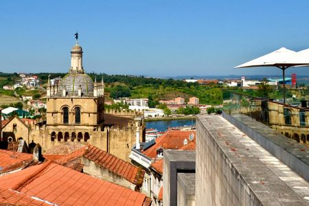 Self-guided discovery walk of Coimbra's cathedrals and Calla Lilies