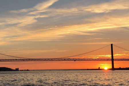 Lisbon sunset sail with drinks and snacks