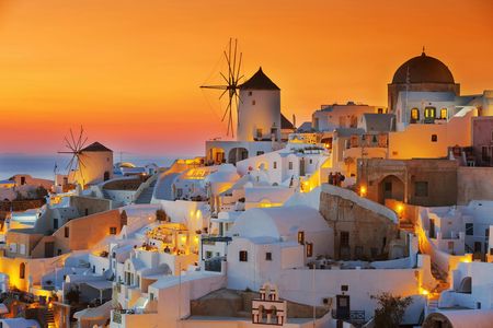 Volcanic islands sunset dinner cruise in Santorini