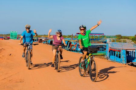 Tonle Sap floating village bike tour and sunset cruise