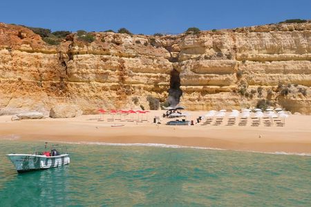 Guided boat trip with extra swimming time and beach BBQ from Albufeira
