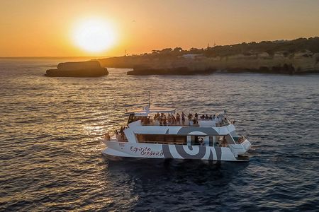 Sunset guided boat trip with secluded beach BBQ from Albufeira