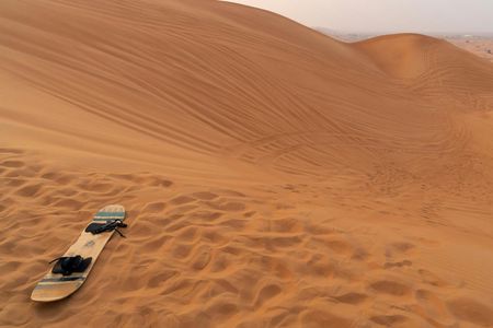 Sandboarding and secret paradise valley full-day tour with pickup