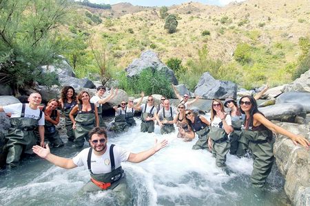 River trekking guided experience in the Alcantara Gorges