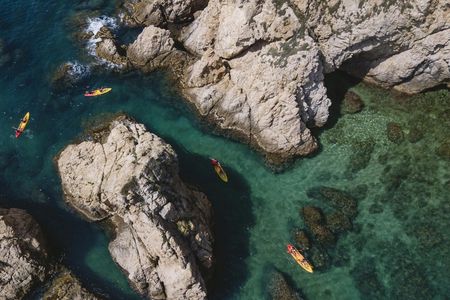 Kayak and snorkel in Tossa de Mar with three course meal