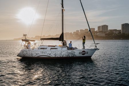 Sailboat cruise on the Douro River at sunset