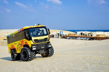 Monster bus tour in the desert with Al Majles Resort day pass