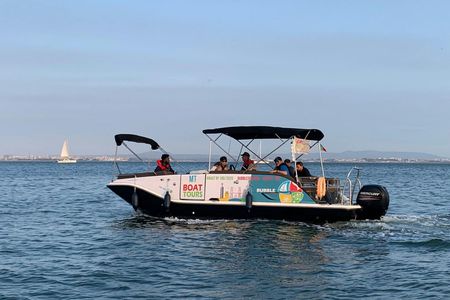 Sightseeing cruise with glass of champagne in Lisbon