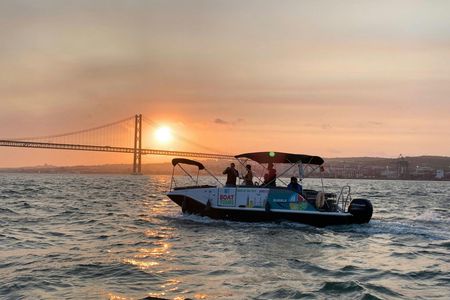 Tagus river night cruise with glass of champagne