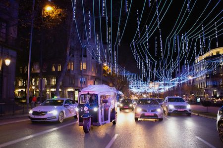 Madrid Christmas lights tour by private Eco Tuk Tuk