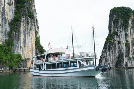 Surprise Cave and Titop Island full-day cruise from Hanoi