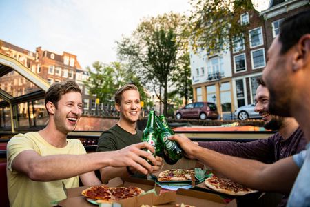 Pizza canal cruise in Amsterdam