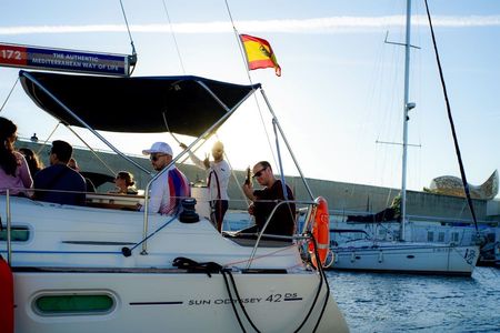 Barcelona sunset sailing experience with live Spanish guitar