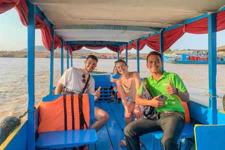 Floating village Vespa and boat sunset tour